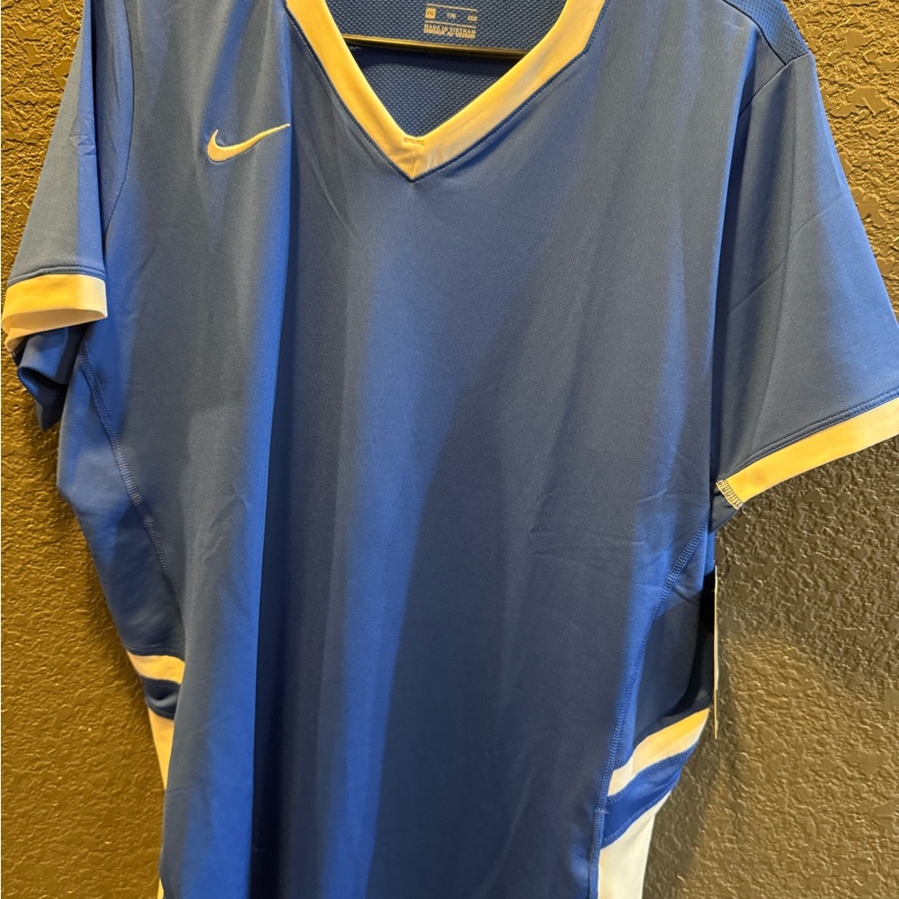Nike Women’s Blue top with white Trim